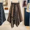 Ropa de verano para mujer talla grande, nuevo estilo para damas talla grande, elegante falda de paraguas a cuadros irregulares retro, falda midi estilizada y favorecedora