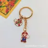 Llavero de Mario Super Mario Colgante Creativo Hongo Rojo Lindo Dibujo Animado de Estudiante Colgante para Llavero