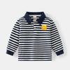 Camisa Polo de Contraste Rayada en Blanco y Negro para Niños Nueva Otoño 2025 Camiseta Casual de Manga Larga con Logo de Cara Sonriente en el Pecho Cuello Solapa