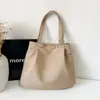 Bolsa feminina casual de grande capacidade para atacado 2026 nova moda simples bolsa de lona de ombro único bolsa sacola de trabalho para o ombro