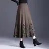 Falda de Lana Tejida con Flores Otoño e Invierno 2025 Nueva Elástica de Cintura Alta con Dobladillo Ancho Moda Gruesa Larga Falda de Línea A