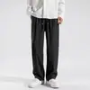 Direto do fabricante: Calça Esportiva Casual Versátil Masculina de Verão Fina de Seda Gelada Marca da Moda Tamanho Grande Jogger Esportiva Nove Pontos Longa