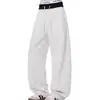 Pantalones para hombre de corte inclinado estilo americano con perneras curvas, que ofrecen un look relajado y casual, adecuados para deportes y uso diario, con un diseño de pierna recta holgada y un estilo de pantalón largo casual versátil