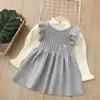 Conjunto de chaleco de punto para niña y falda Aekyung otoño e invierno gato de dibujos animados chaleco falda y camiseta básica conjunto de dos piezas