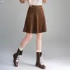 Saia Midi de Cintura Alta Afinando com Estampa de Letras 2026 Outono/Inverno Nova Casual Versátil Barra Larga Saia Feminina