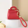Bolsa para monedas pequeña de color caramelo linda estilo coreano, monedero, llavero para llaves, bolsa pequeña creativa de macarrón para llevar en la mano