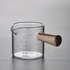 Taza Pequeña de Leche de Vidrio Transparente para Hogar con Escala, Mini Jarra de Leche de Vidrio de Borosilicato Alto con Asa Lateral de Madera y Doble Boquilla, Taza de Café