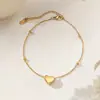 Tobillera de Acero de Titanio y Oro de 18 Quilates para Mujer, Cadena para el Pie de Nuevo Estilo Otoño/Primavera Transfronterizo, Lujo Ligero Nicho, Alta Gama para Chicas, No se Desvanece, Venta al por Mayor