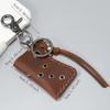 Llavero colgante personalizado transfronterizo Encendedor portátil para camping al aire libre Estuche de cuero Estuche de cuero PU retro para encendedor