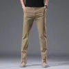 Pantalones casuales de alta gama para hombre de primavera y otoño italianos, nuevos pantalones largos rectos ajustados elásticos de negocios 2026