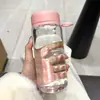 Taza simple y transparente, plástico de alta calidad, resistente al calor, portátil y elegante: una botella de agua versátil tanto para hombres como para mujeres, adecuada para estudiantes de secundaria y preparatoria.