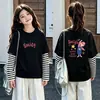 Camiseta de algodón a rayas de manga larga, estilo coreano y moderna, para niñas, un nuevo diseño de primavera/otoño, corte holgado, versátil y con cuello redondo, adecuada para niños de talla mediana a grande