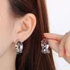 Aretes de viento frío europeo y estadounidense chapados en oro de 18k con el símbolo de infinito número 8, diseño de alto sentido para mujer, aretes de acero de titanio al por mayor