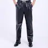 Pantalones de cuero aceitado overol de cuero para hombre a prueba de viento matadero japonés anti-suelto a prueba de salpicaduras de cuero todo partido Hong Kong otoño e invierno