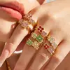 Nuevo anillo de titanio con baño de oro, incrustaciones de circonita, estilo dopamina, de trébol de cuatro hojas de la suerte, personalizado, de lujo ligero, para mujer