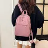 Mochila Casual Simples Transfronteiriça Nova Cor Sólida Versátil para o Dia a Dia Esportes Versão Coreana Moda de Nicho Mochila Escolar para Estudante