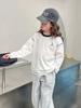 Camiseta Blanca de Manga Larga para Niñas Top Infantil Camiseta Base Ropa para Niños Grandes Ropa Interior Estilo Nuevo de Primavera 2025 para Niña