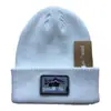 Directo de fábrica sombrero marca de moda moda japonesa sombrero de punto para exteriores cálido a prueba de frío sombrero frío todo partido sombrero de lana etiquetado