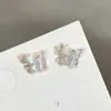 Brincos de agulha de prata s925 para mulheres, estilosos e modernos, joias de nicho de alta qualidade estilo Hong Kong, atacado transfronteiriço para mulheres