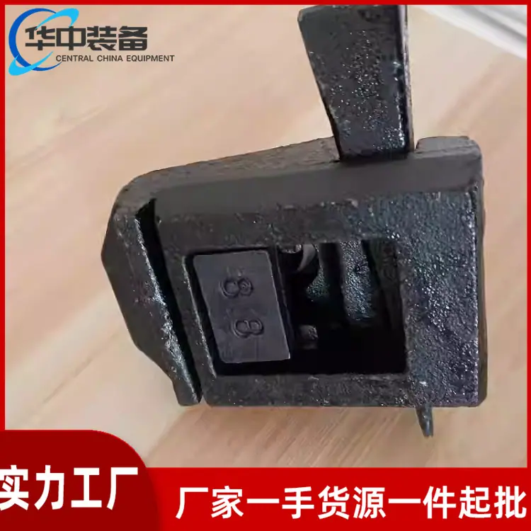 压轨器12