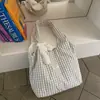 Bolso grande de estilo relajado para mujer, nuevo modelo 2026, ligero y versátil, adecuado para ir al trabajo, bolso de hombro, bolso cruzado, bolso tote, bolso de lona