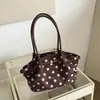 Bolso de cubo de nicho estilo coreano al por mayor para mujer, nuevo bolso de hombro con lunares y bloques de color para otoño de 2026, bolso de axila para el día a día