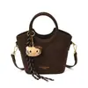 Bolso Pequeño Súper Popular para Mujer Otoño e Invierno Retro Nuevo 2025 Bolso de Hombro Cruzado Versátil para Mujer Bolso Bandolera Casual Bolso Cubo