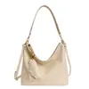 Bolsa Tote Simples Transfronteiriça para Comutação para Mulheres Nova Moda Primavera 2026 Versátil Textura de Alta Qualidade Bolsa de Ombro Transversal