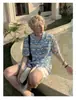 Camisa Casual Masculina e Feminina 2026 Verão Nicho Férias Manga Curta Bloqueio de Cores Onduladas Vazada Versátil Tendência Leve