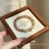 Qiaoen Té de Leche Natural Luna Simple y Versátil Diseño Pulsera de Cristal