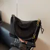 Bolsa de ombro casual retrô transfronteiriça para mulheres, nova moda outono 2026, bolsa de mão moderna, bolsa transversal versátil para o dia a dia