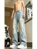 Jeans retro azules rasgados inclinados para hombre, pantalones de diseño de alta calle para otoño, pantalones de pierna recta adelgazantes ligeramente acampanados