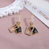 Pendientes colgantes de cristal negro con microincrustaciones de circonita, pendientes de lujo ligeros de alta gama, de diseño nicho.