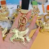Novo Modelo Ouro Puro 999 "Fique Rico Instantaneamente" Pingente de Bolsa Chaveiro da Princesa Cavalo Pequeno Charme de Chaveiro Folha de Ouro