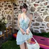 Traje de baño de dos piezas con volantes estilo francés ligeramente personalizado para mujer, conjunto puro estilo resort costero, traje de baño sin tirantes al por mayor
