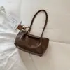 Bolsa de ombro estilosa e espaçosa para mulheres, nova coleção 2026, design moderno e minimalista, adequada para o uso diário, deslocamento e como bolsa de compras (tote bag).