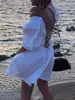Saia Curta Costas Nuas com Tiras Cruzadas Feminina Europeia e Americana Chegada Nova Primavera/Verão 2026 Vestido Feminino Cor Sólida Manga Bufante Cadarço Emagrecedor