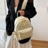Mochila Estilo Academia para Mulheres 2025 Nova Nicho Versátil Bolsa de Mão Tendência Estilosa Bolsa Transversal de Luxo
