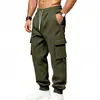 Pantalones deportivos de punto holgados para hombre, ropa de trabajo versátil con múltiples bolsillos, para exteriores, casual, deportiva, de comercio exterior transfronterizo europeo y americano, talla grande