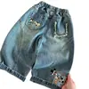 Jeans de alta qualidade para meninos e meninas, novo estilo primavera e outono 2026, estampa de desenho animado, retalhos, calça curva versátil