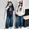 Camiseta base de manga de lunares de dos piezas falsas para niñas de otoño 2026 nueva moda coreana de algodón holgada para niños mayores