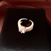 Anillo abierto redondo de circón bañado en oro real de 18k, sensación de lujo ligero de alta gama, joyería femenina moderna y versátil