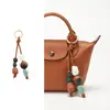 Venta directa del fabricante, adecuado para colgantes de cuentas de cerámica Longchamp xtra y adornos de piedra para bolsos Longchamp nuevos