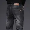 Jeans negros y grises de corte ajustado para hombre, de alta gama, para Otoño/Invierno 2026, pantalones largos casuales elásticos de moda con forro polar