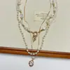Collar redondo de perlas con cuentas vintage, moda nicho de alta gama, cadena para la clavícula simple y elegante, accesorio de lujo ligero exquisito y versátil