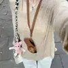 Bata Transparente Estilo Perezoso Color Avena con Protección Solar Conjunto de Dos Piezas para Mujer Primavera Temprana 2026 Camiseta sin Mangas Versátil Anti-Exposición