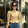 Camisa de satén francesa FCB para mujer, otoño/invierno 2026, línea A entallada a la cintura, cuello alto, top de manga abullonada, estilo para ir al trabajo para mujer