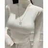 Ropa de Mujer de Comercio Exterior--Moda Femenina Coreana Invierno 2023 Ajustado Color Sólido Cuello Alto Versátil Ropa de Trabajo Manga Larga Casual Top Corto