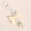 Colgante de macarrón con lazo de moda accesorio para teléfono con corbata de lazo para llaves accesorio para funda de auriculares accesorio para bolsa y ropa regalo para estudiante
