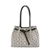 Bolso casual de gran capacidad con lunares para mujer, nuevo bolso de hombro de moda 2026 para ir al trabajo, bolso tote de alta gama, bolso tipo cubo